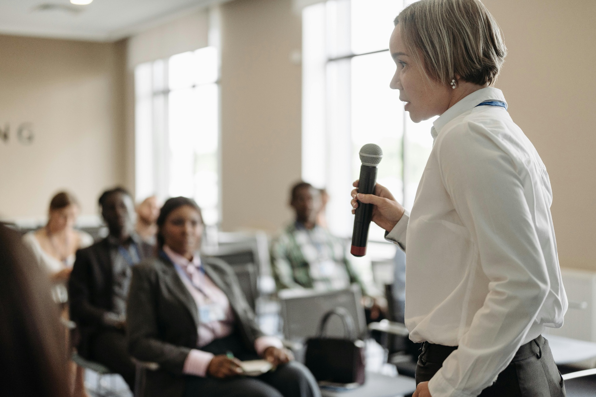 A program partner addressing a WorldBoston audience